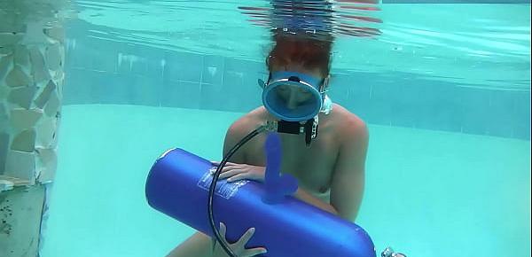  Hungarian pornstar Minnie Manga enjoys riding toy underwater